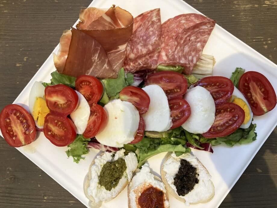 Cheese and prosciutto plate from the food court of the Central Market in Florence