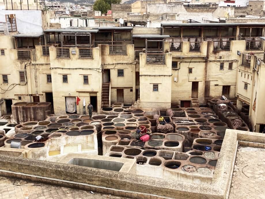 Looking down on men at work in the tannery in Fes, Morocco