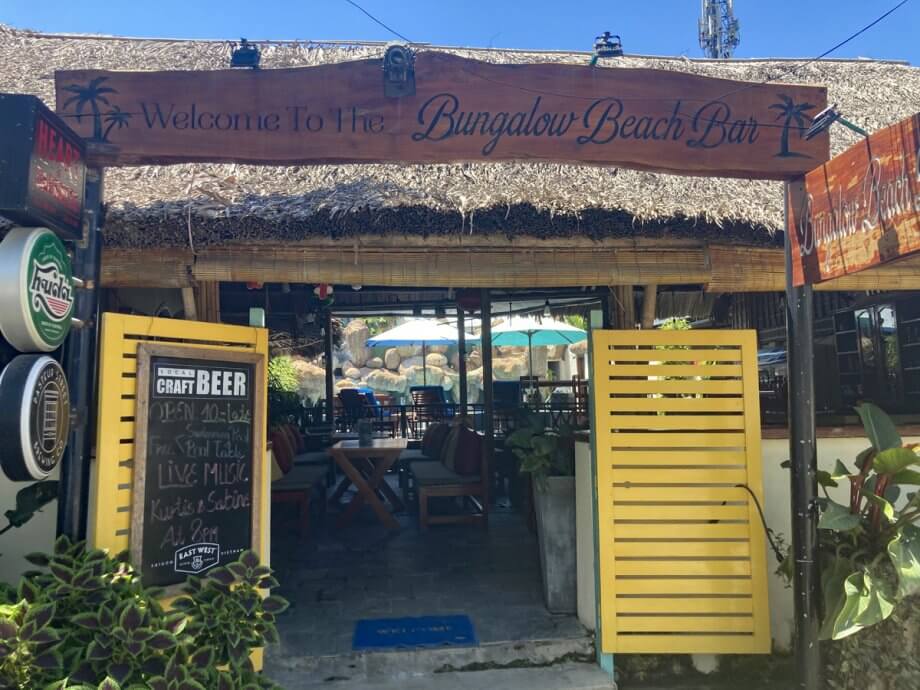 Front of the Bungalow Beach Bar with bright orange shutters in An Bang Beach