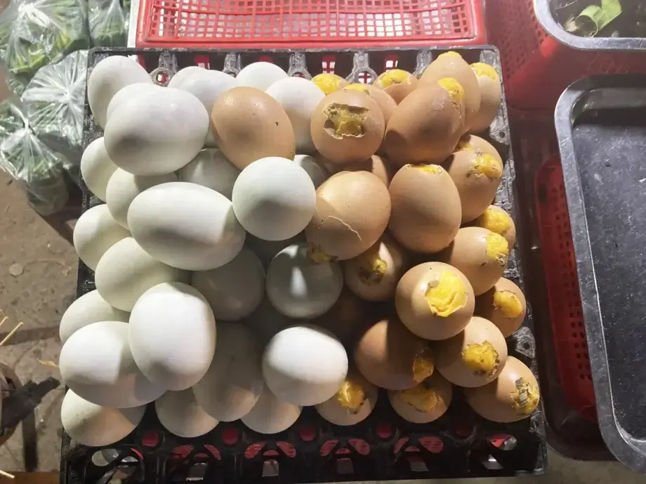 Balut and grilled eggs at a market in Siem Reap Cambodia